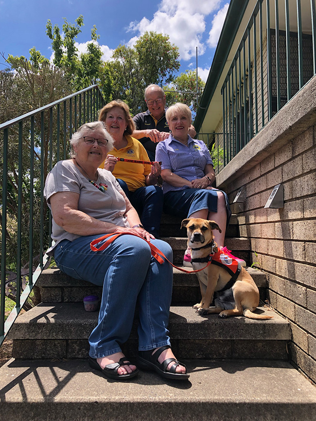 Hearing Dog Elroy and recipient Helen, with Lions Club of Mount Panorama